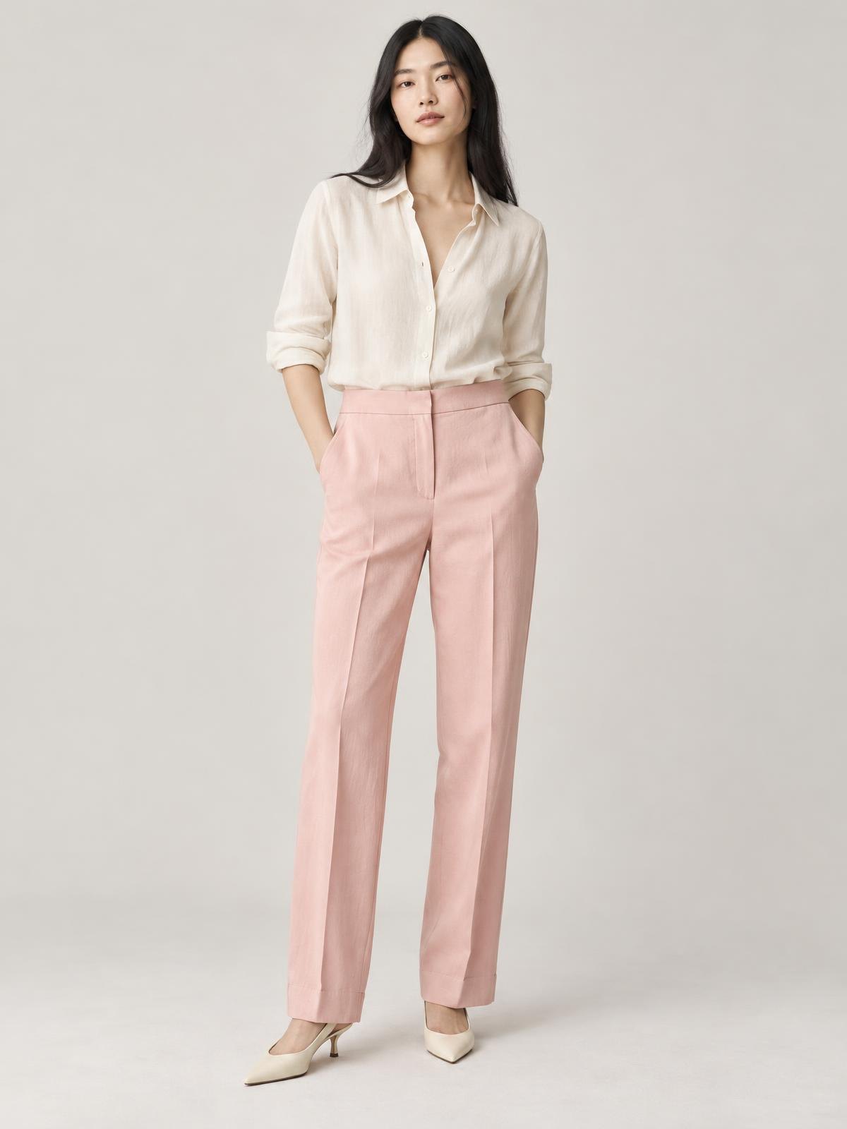 Numera Studio Cotton Twill Trouser in blush pink worn by a model