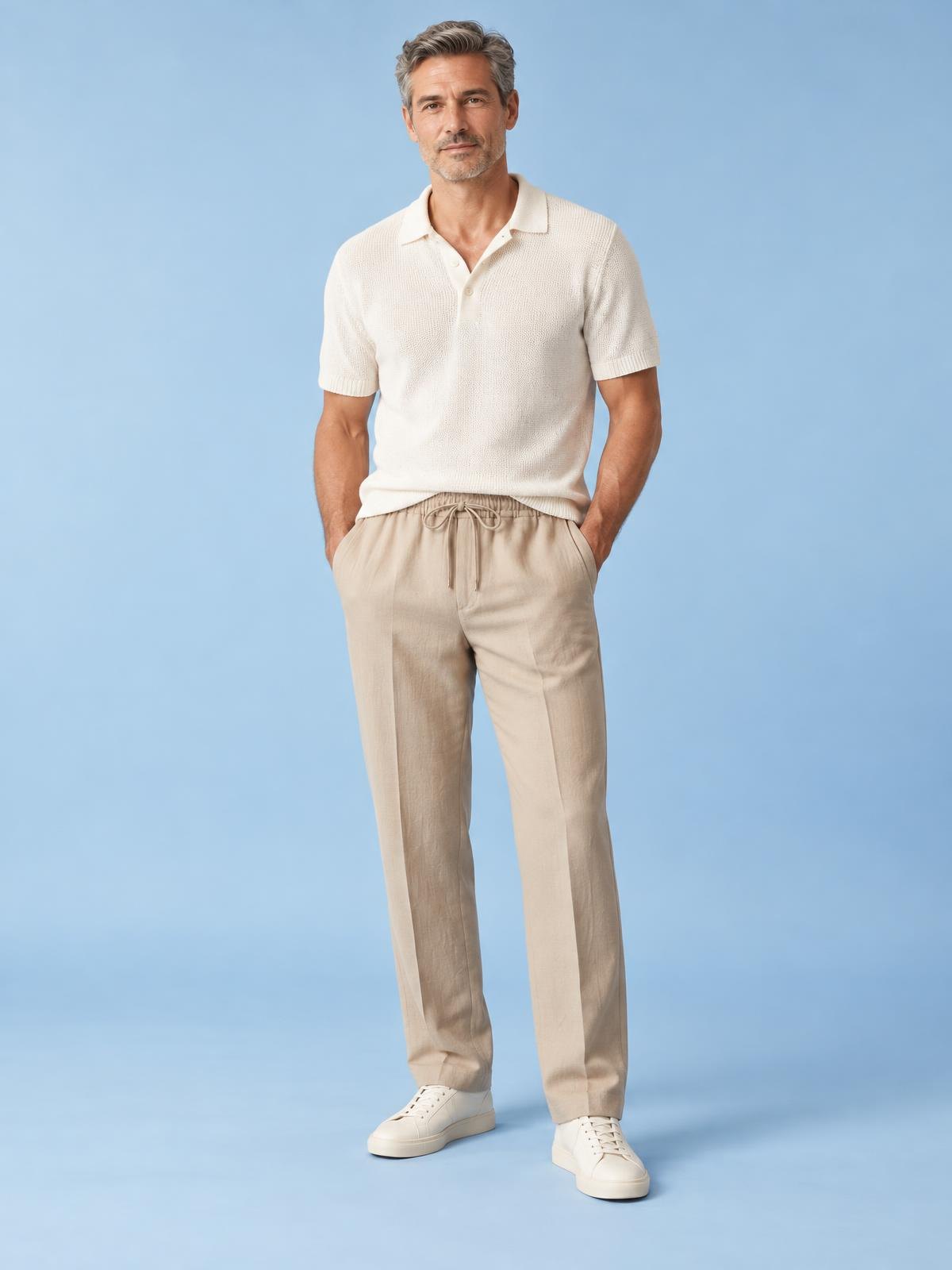 Salt Meridian Cotton Drawstring Trouser in chalk worn by a model