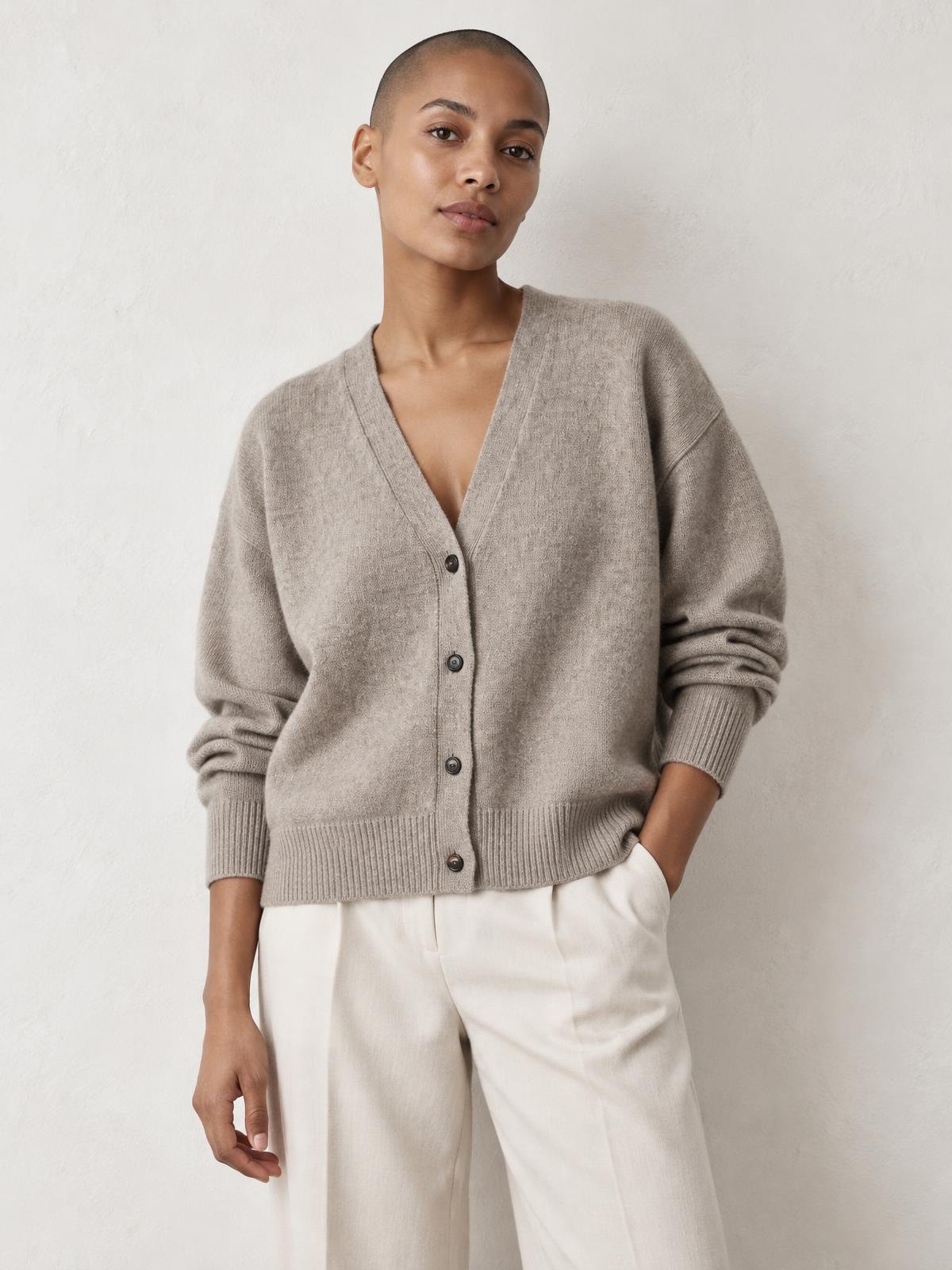 Aurelia Nord Boxy Alpaca Cardigan in ecru worn by a model