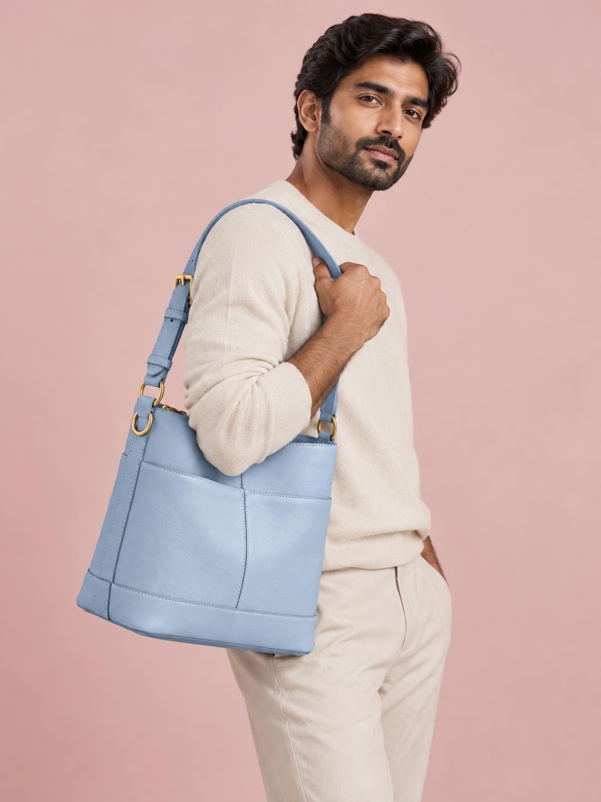 Objet Vide Panelled Shoulder Bag in powder blue — worn by a model
