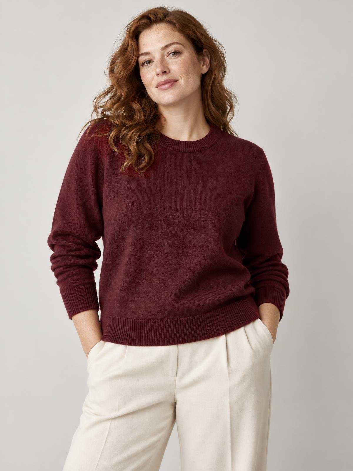 Aurelia Nord Undyed Merino Crewneck in burgundy worn by a model