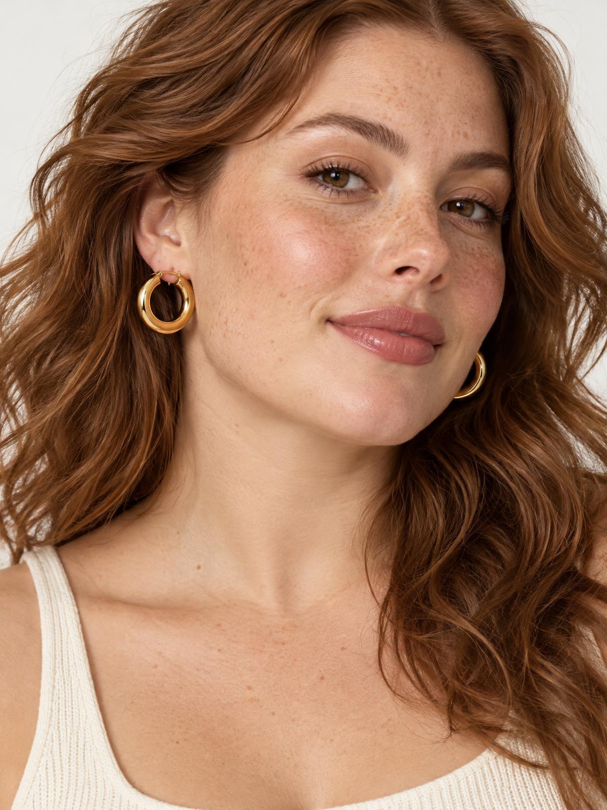 Halden Stone Solid Hoop Earring in silver — worn by a model