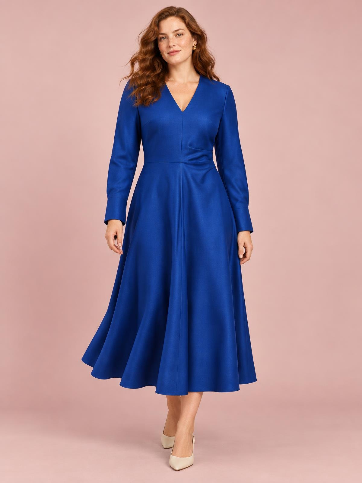 Aurelia Nord Folded Wool Midi Dress in cobalt worn by a model