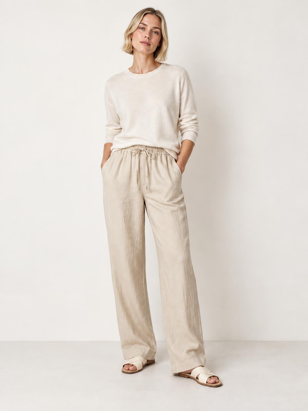 Salt Meridian Drawstring Linen Trouser in chalk worn by a model