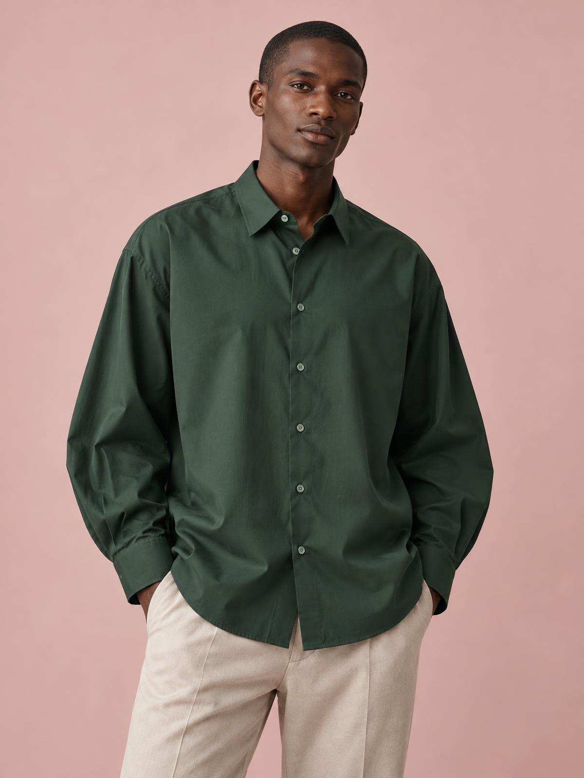 Mirai Atelier Wide Sleeve Cotton Shirt in forest green worn by a model
