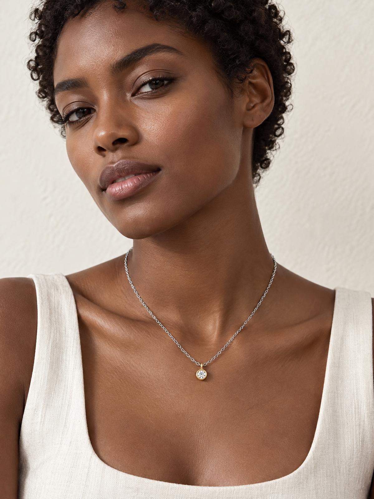 Atelier Verrine 18k Fine Pendant in silver — worn by a model
