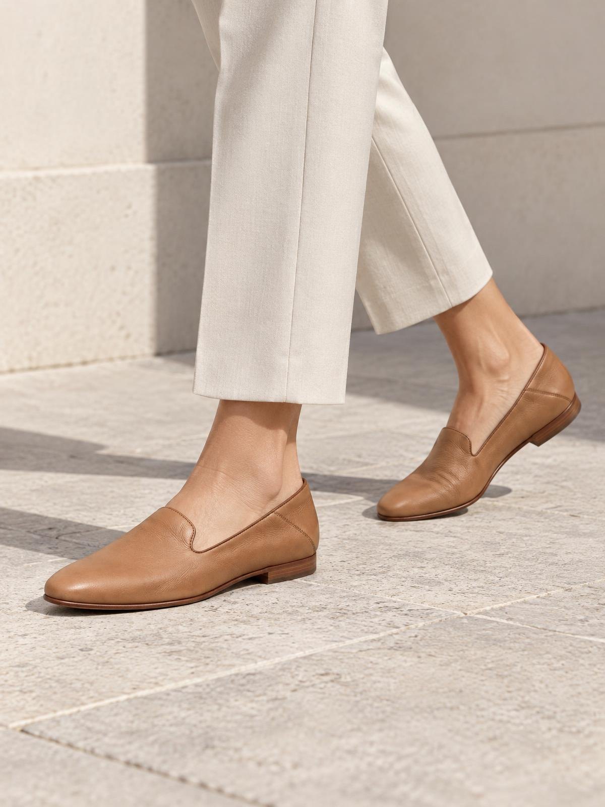 Aurelia Nord Flat Leather Slipper — worn by a model