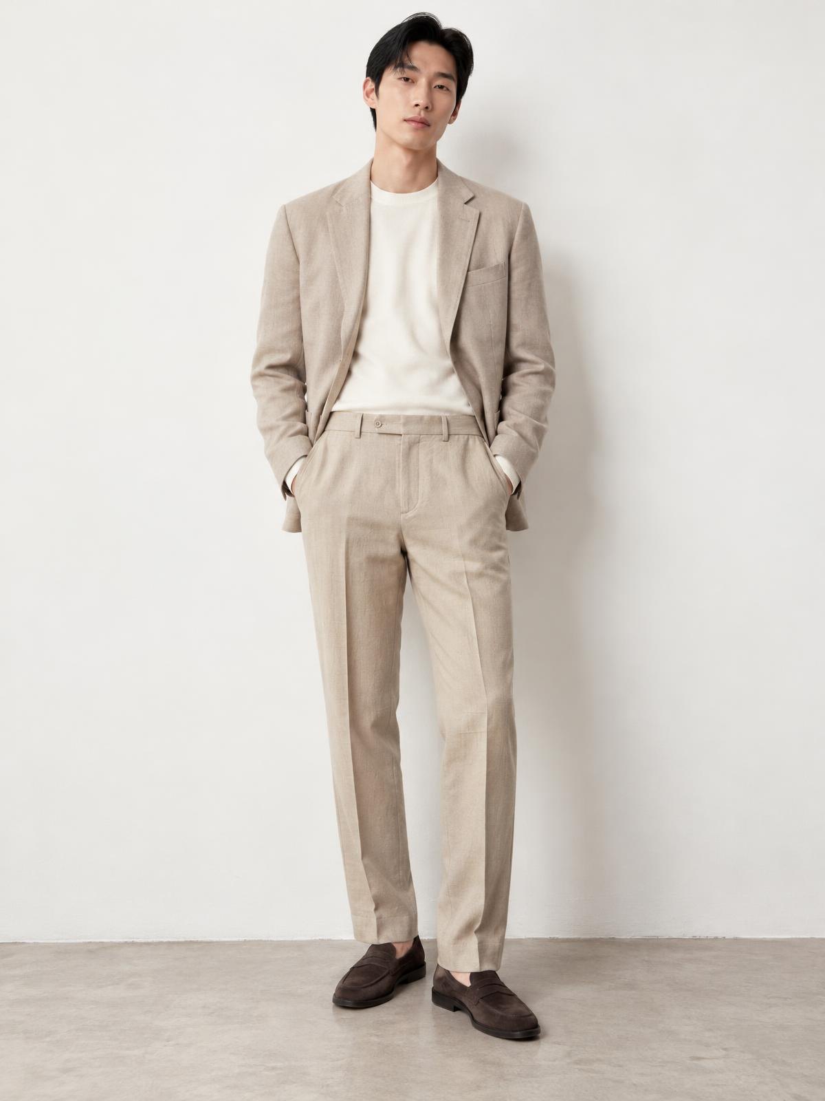 Numera Studio Cotton Twill Trouser in ecru worn by a model
