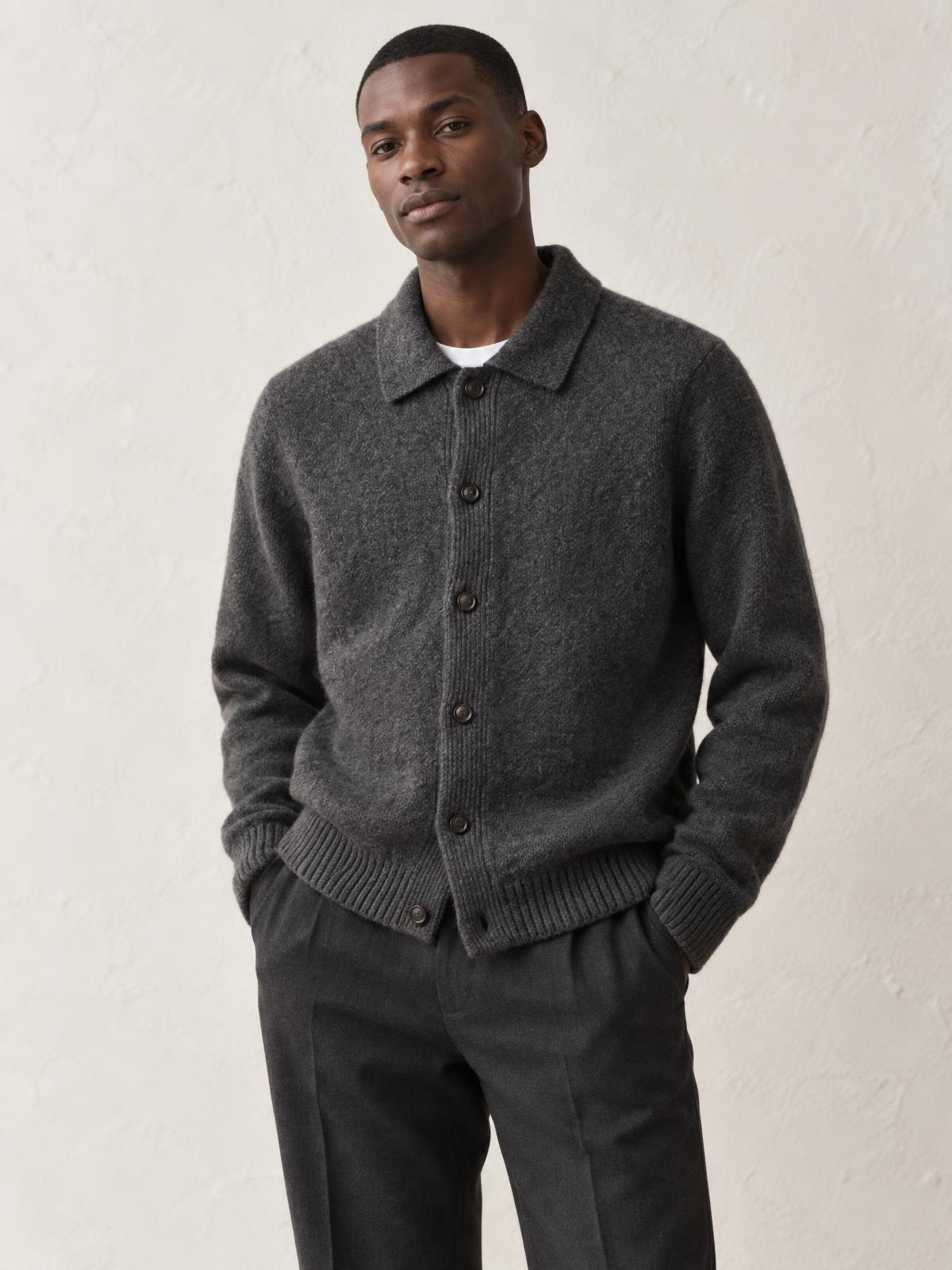 Mirai Atelier Boiled Wool Cardigan in indigo worn by a model
