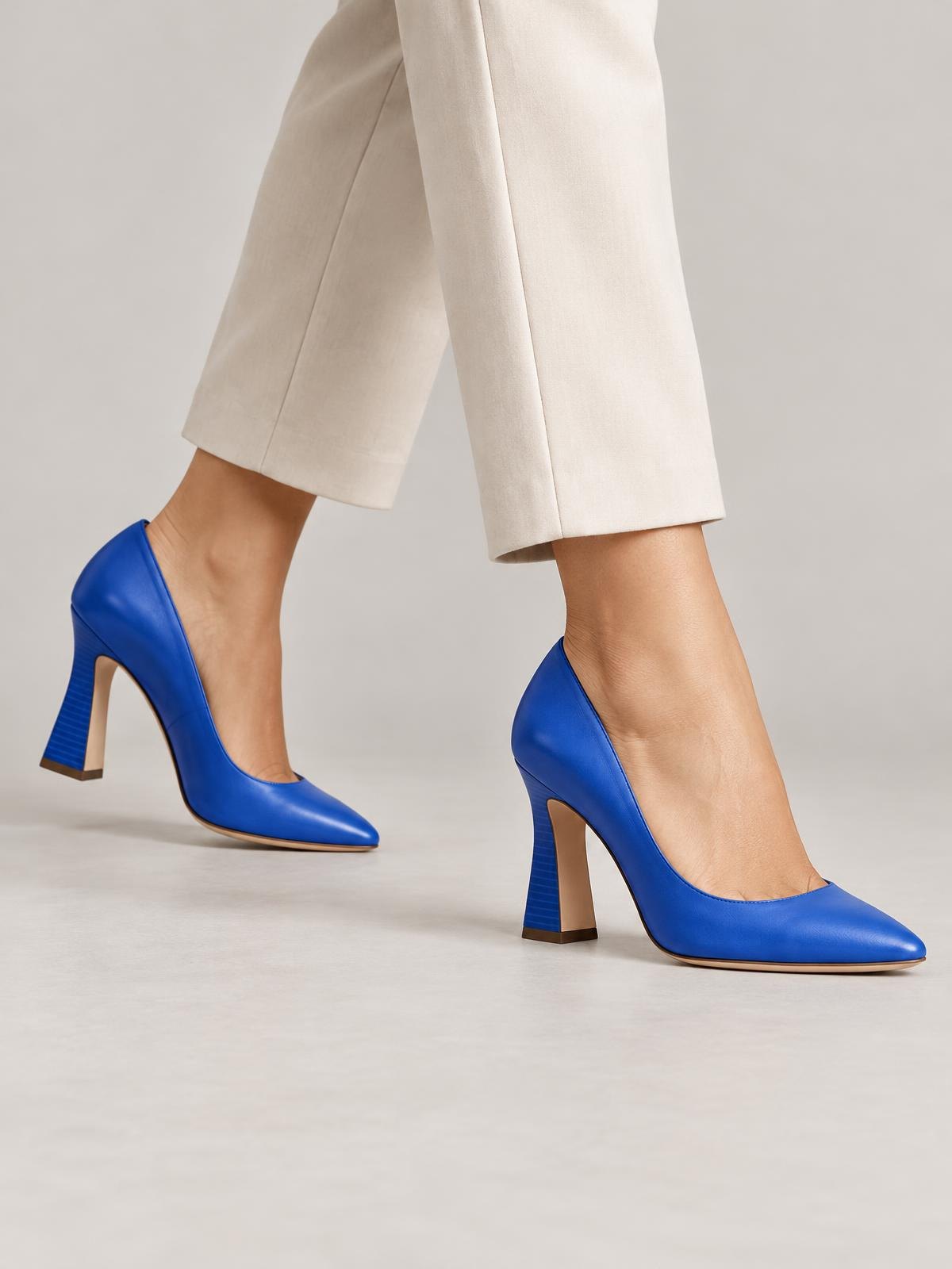 Lune Boreale Sculpted Heel Pump in cobalt — worn by a model