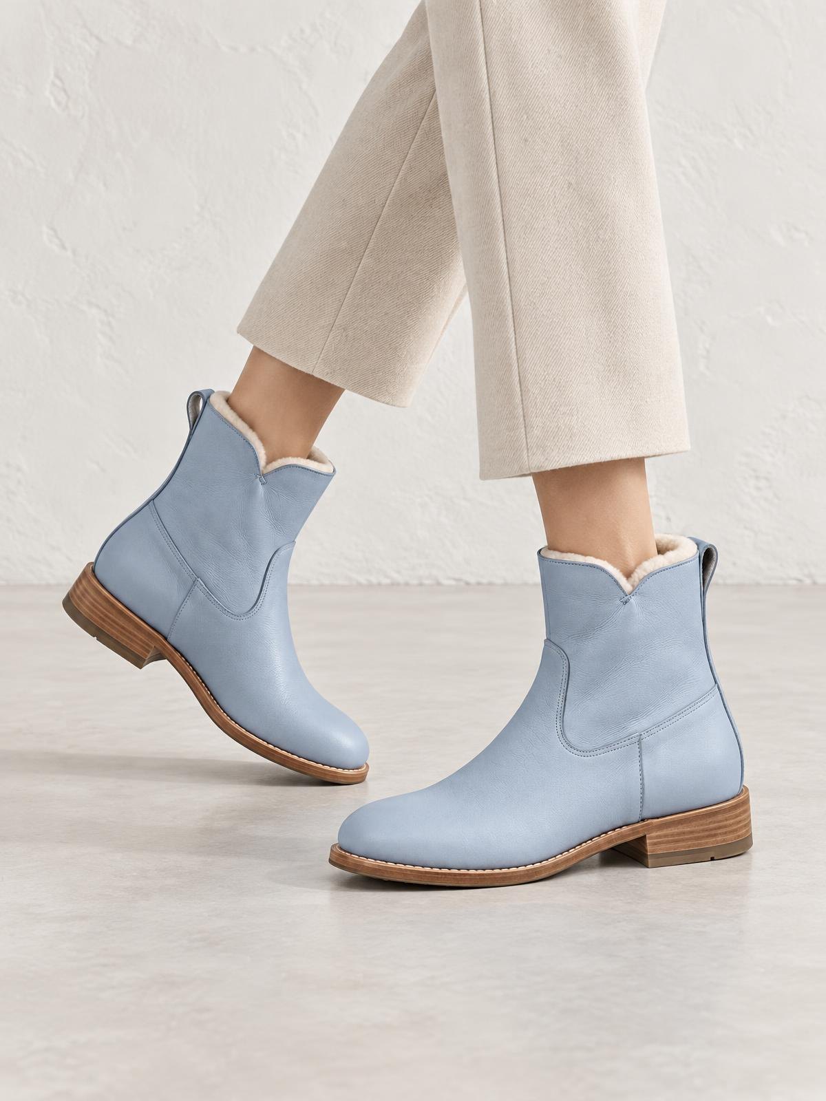 Aurelia Nord Minimal Wool Boot in powder blue — worn by a model