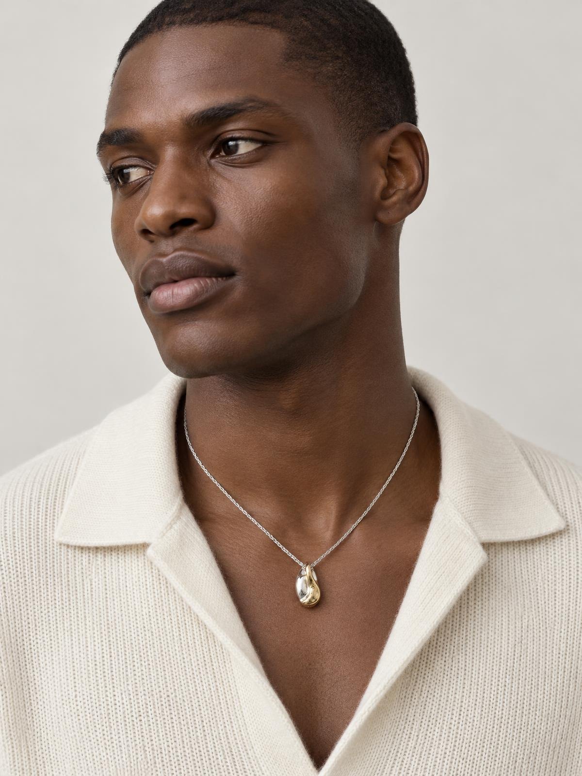 Halden Stone Cast Pendant Necklace in silver — worn by a model