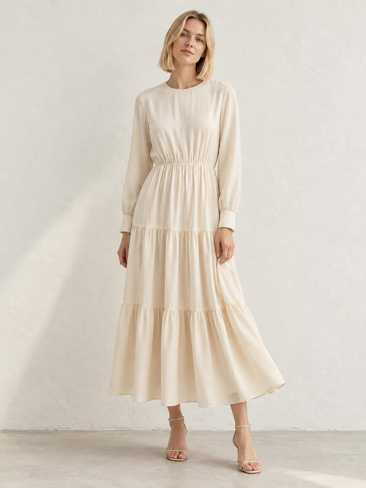 Salt Meridian Tiered Cotton Dress worn by a model