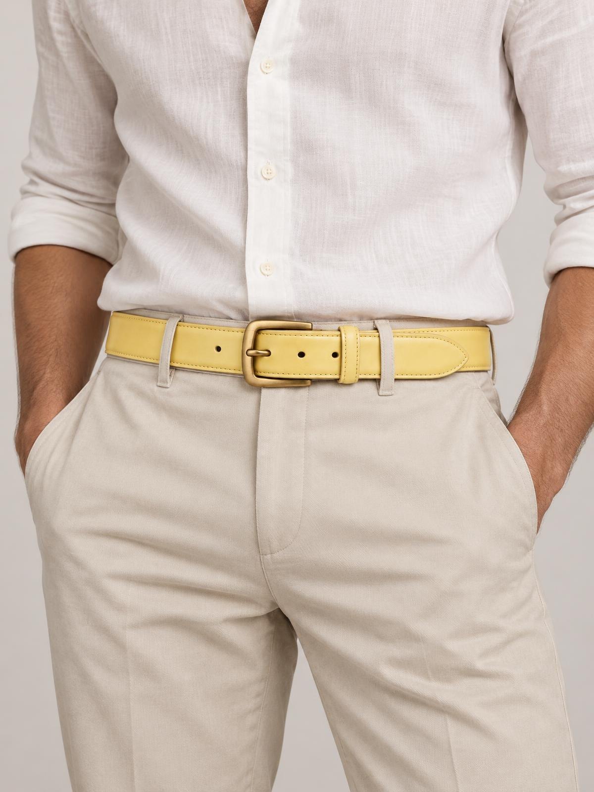Objet Vide Cast Hardware Waist Belt in butter yellow — worn by a model