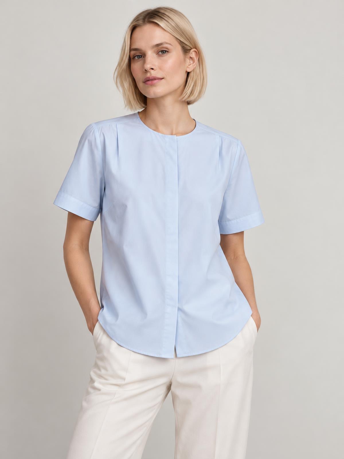 Lune Boreale Silk Bias Blouse in powder blue worn by a model