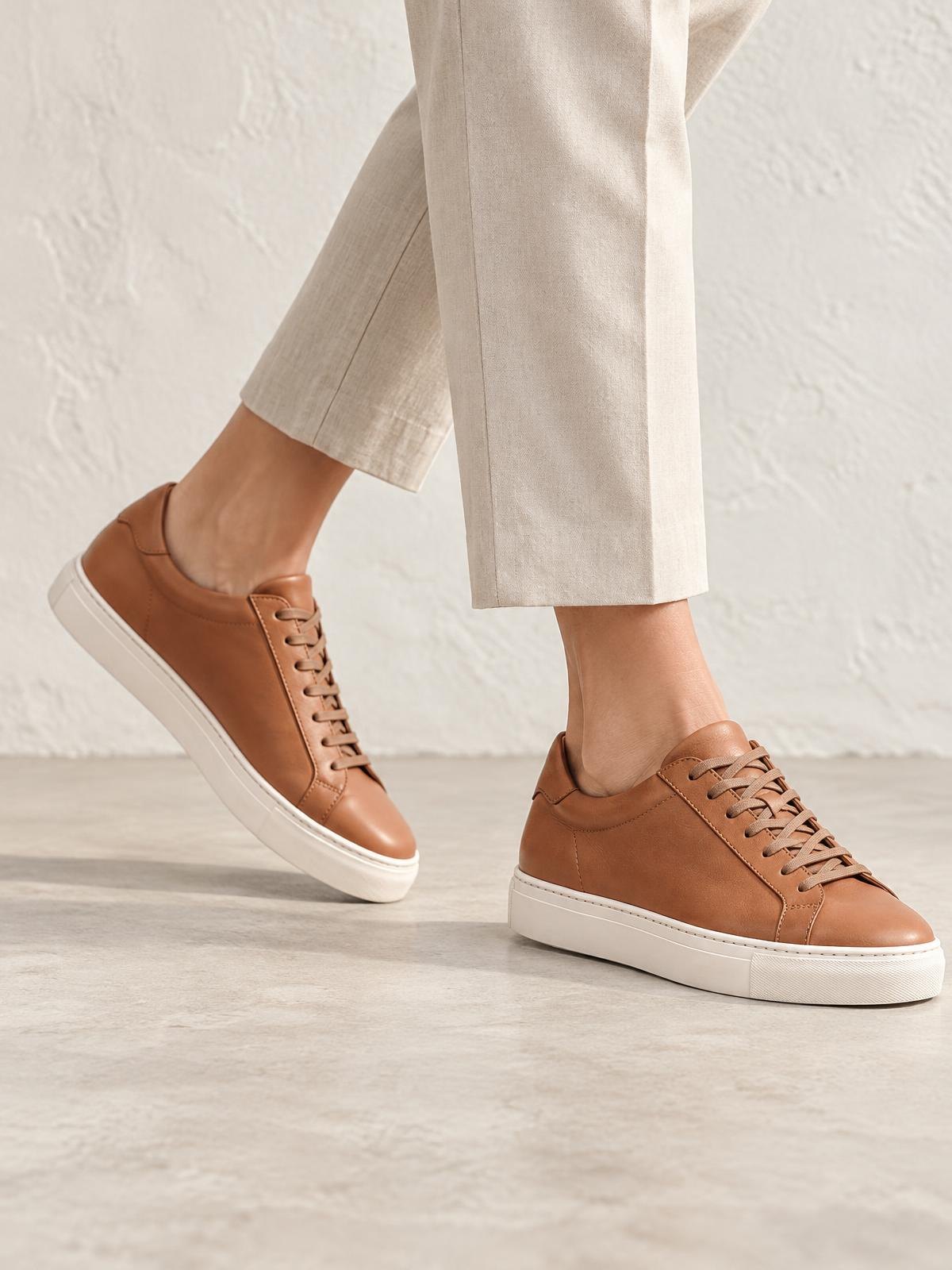 Kestrel Form Low Leather Sneaker — worn by a model