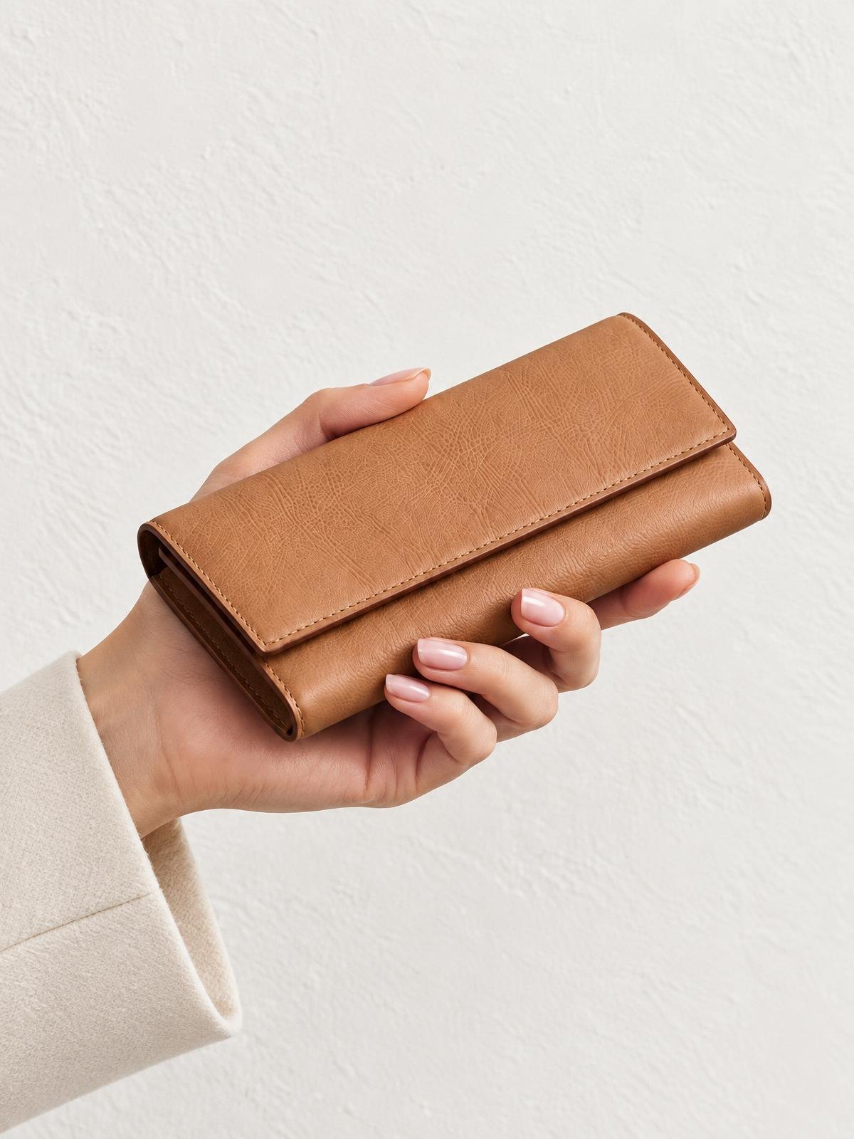 Serra Cardo Long Leather Wallet — worn by a model